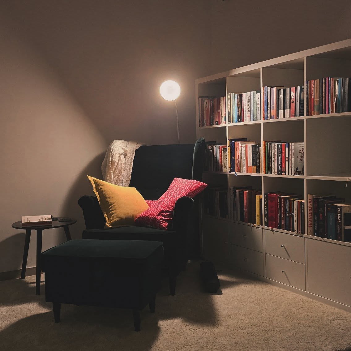 Divjyot's personal library — a wall of books